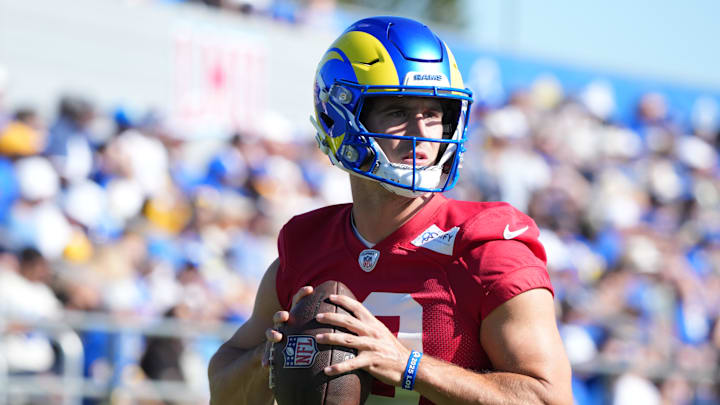 Jul 23, 2025; Los Angeles, CA, USA; Los Angeles Rams quarterback Stetson Bennett (13) throws the ball during training camp at Loyola Marymount University. Mandatory Credit: Kirby Lee-Imagn Images