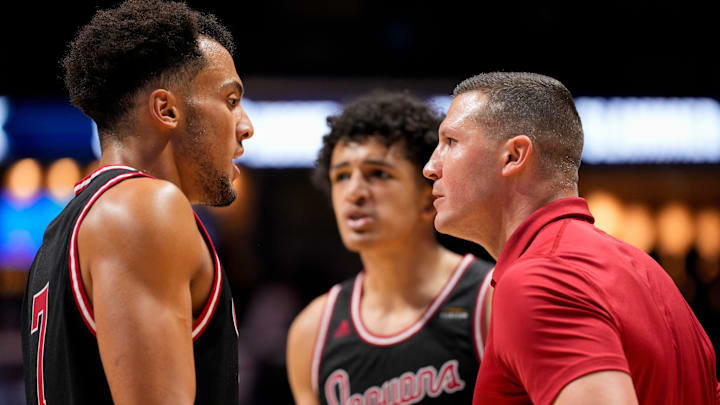 IU Indy Jaguars head coach Paul Corsaro pulls in forward Sean Craig (7) during timeout in the first half of the NCAA Men’s basketball game between the Xavier Musketeers and the IU Indy Jaguars at the Cintas Center at Xavier University in Cincinnati on Friday, Nov. 8, 2024.