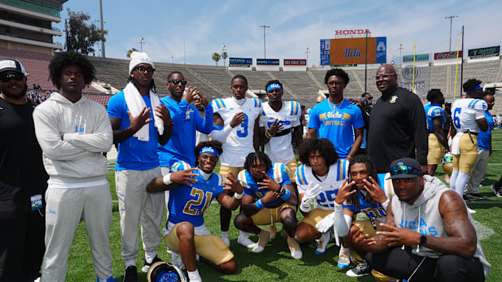 May 2, 2026; Pasadena, CA, USA; UCLA Bruins defensive backs Dante Lovett (21), Osiris Gilbert (18), Kuron Jabari Jr. (25) and Robert Stafford III (3) and Rodrick Pleasant pose during the spring game at Rose Bowl. Mandatory Credit: Kirby Lee-Imagn Images