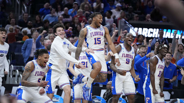 Mar 27, 2025; San Francisco, CA, USA; Florida Gators guard Alijah Martin (15), guard Will Richard (5) and center Rueben Chinyelu (9) celebrate on the Florida Gators bench during the second half against the Maryland Terrapins during a West Regional semifinal of the 2025 NCAA tournament at Chase Center. Mandatory Credit: Kyle Terada-Imagn Images