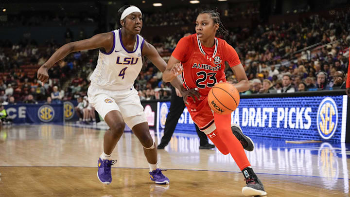 Mar 8, 2024; Greensville, SC, USA; Auburn Tigers guard Honesty Scott-Grayson (23) drives to the