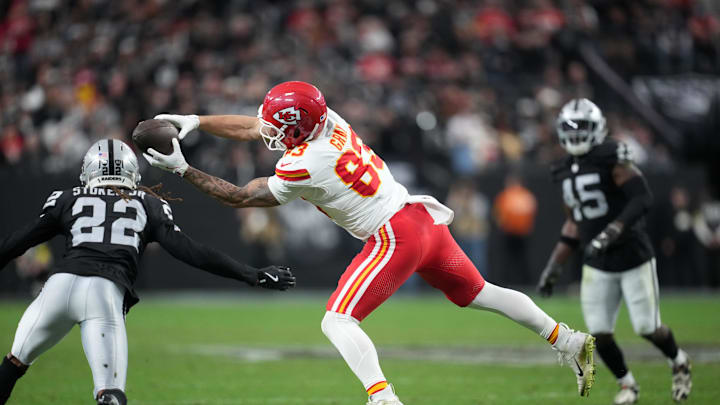 Jan 4, 2026; Paradise, Nevada, USA; Kansas City Chiefs tight end Noah Gray (83) catches a pass against Las Vegas Raiders cornerback Eric Stokes (22) in the second half at Allegiant Stadium. Mandatory Credit: Kirby Lee-Imagn Images