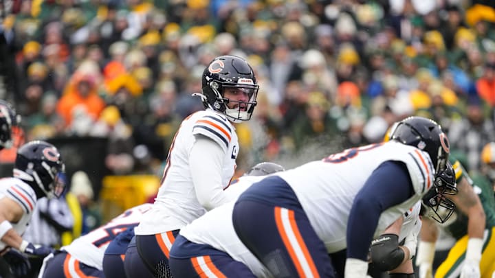 Jan 5, 2025; Green Bay, Wisconsin, USA;  Chicago Bears quarterback Caleb Williams (18) during the game against the Chicago Bears at Lambeau Field. Mandatory Credit: Jeff Hanisch-Imagn Images