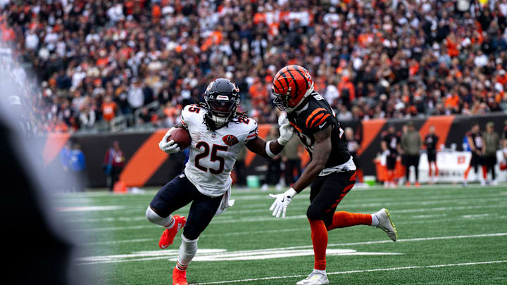 Chicago Bears running back Kyle Monangai (25) stiff arms Cincinnati Bengals cornerback Dax Hill (23) in the second quarter of the NFL football game between Chicago Bears and Cincinnati Bengals at Paycor Stadium in Cincinnati on Nov. 2, 2025. Chicago Bears running back Kyle Monangai (25) stiff arms Cincinnati Bengals cornerback Dax Hill (23) in the second quarter of the NFL football game between Chicago Bears and Cincinnati Bengals at Paycor Stadium in Cincinnati on Nov. 2, 2025.