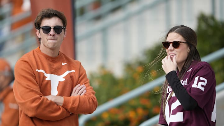 Nov 28, 2025; Austin, Texas, USA; Texas Longhorns fan and a Texas A&M Aggies fan before a game at Darrell K Royal-Texas Memorial Stadium. Mandatory Credit: Scott Wachter-Imagn Images Nov 28, 2025; Austin, Texas, USA; Texas Longhorns fan and a Texas A&M Aggies fan before a game at Darrell K Royal-Texas Memorial Stadium. Mandatory Credit: Scott Wachter-Imagn Images