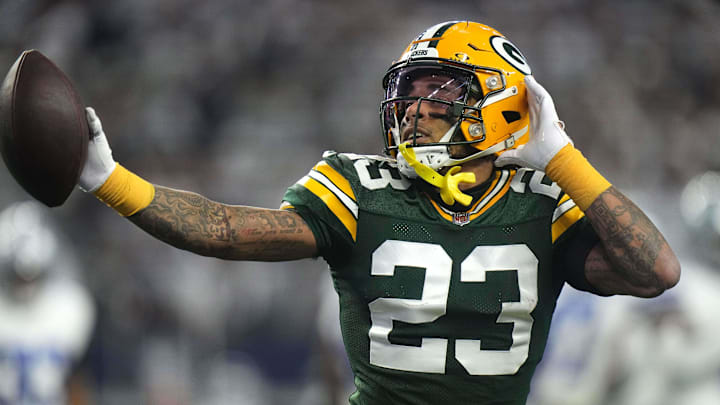 Jan 14, 2024; Arlington, Texas, USA; Green Bay Packers cornerback Jaire Alexander (23) reacts after intercepting a pass during the first quarter of the wild card playoff game against the Dallas Cowboys Sunday, January 14, 2024 at AT&T Stadium in Arlington, Texas. Mandatory Credit: Mark Hoffman-Imagn Images