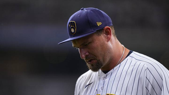 Jun 28, 2026; Milwaukee, Wisconsin, USA;  Milwaukee Brewers pitcher Joel Kuhnel (59) hangs his head following the tenth inning against the Chicago Cubs at American Family Field. Mandatory Credit: Jeff Hanisch-Imagn Images