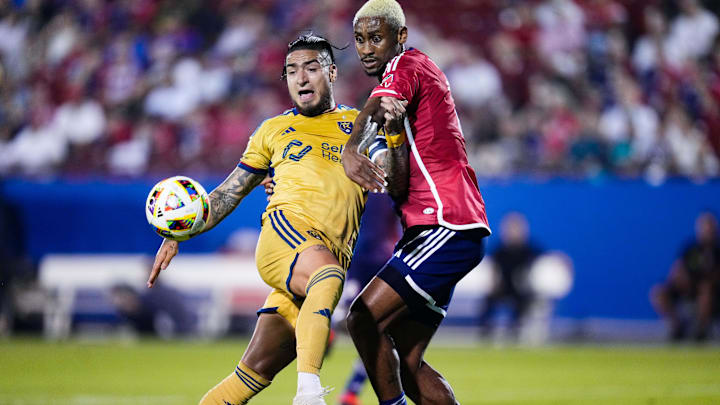 Real Salt Lake forward Cristian Arango (9) and FC Dallas defender Nkosi Tafari (17) battle for the ball during the second half at Toyota Stadium 