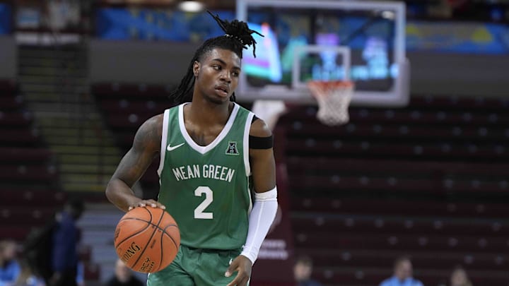 Nov 17, 2023; Charleston, SC, USA; North Texas Mean Green guard Jason Edwards (2) brings the ball up