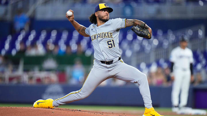 May 22, 2024; Miami, Florida, USA; Milwaukee Brewers pitcher Freddy Peralta (51) throws a pitch against the Miami Marlins during the first inning at loanDepot Park. Mandatory Credit: Rich Storry-USA TODAY Sports
