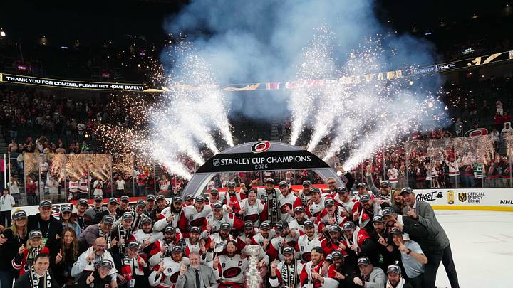 Jun 14, 2026; Las Vegas, Nevada, USA; The Carolina Hurricanes pose with the the Stanley Cup after defeating Vegas Golden Knights in game six of the 2026 Stanley Cup Final at T-Mobile Arena. Mandatory Credit: Stephen R. Sylvanie-Imagn Images Jun 14, 2026; Las Vegas, Nevada, USA; The Carolina Hurricanes pose with the the Stanley Cup after defeating Vegas Golden Knights in game six of the 2026 Stanley Cup Final at T-Mobile Arena. Mandatory Credit: Stephen R. Sylvanie-Imagn Images