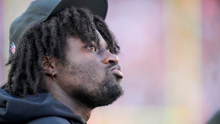 Injured Cincinnati Bengals defensive end Shemar Stewart (97) watches from the sideline in the third quarter of the NFL Week 12 game between the Cincinnati Bengals and the New England Patriots at Paycor Stadium in downtown Cincinnati on Sunday, Nov. 23, 2025. The Bengals fall to 3-8 with a 26-20 loss at home.