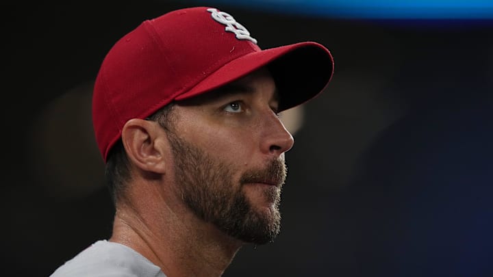 St. Louis Cardinals starting pitcher Adam Wainwright (50) watches.