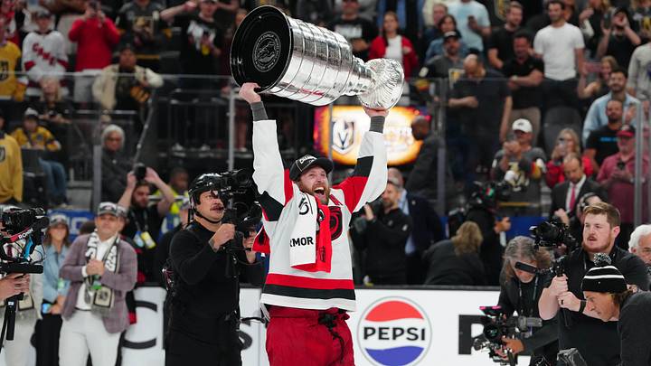 Jun 14, 2026; Las Vegas, Nevada, USA; Carolina Hurricanes left wing Taylor Hall (71) raises the the Stanley Cup after defeating the Vegas Golden Knights in game six of the 2026 Stanley Cup Final at T-Mobile Arena. Mandatory Credit: Stephen R. Sylvanie-Imagn Images