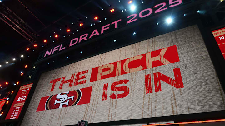 Apr 24, 2025; Green Bay, WI, USA; The San Francisco 49ers logo is projected on the video board during the NFL Draft at Lambeau Field. Mandatory Credit: Kirby Lee-Imagn Images Apr 24, 2025; Green Bay, WI, USA; The San Francisco 49ers logo is projected on the video board during the NFL Draft at Lambeau Field. Mandatory Credit: Kirby Lee-Imagn Images