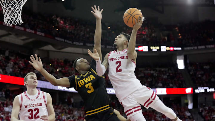 Wisconsin guard Nick Boyd scores against Iowa forward Cam Manyawu during the second half on Sunday, Feb. 22 at the Kohl Center in Madison. Wisconsin guard Nick Boyd scores against Iowa forward Cam Manyawu during the second half on Sunday, Feb. 22 at the Kohl Center in Madison.