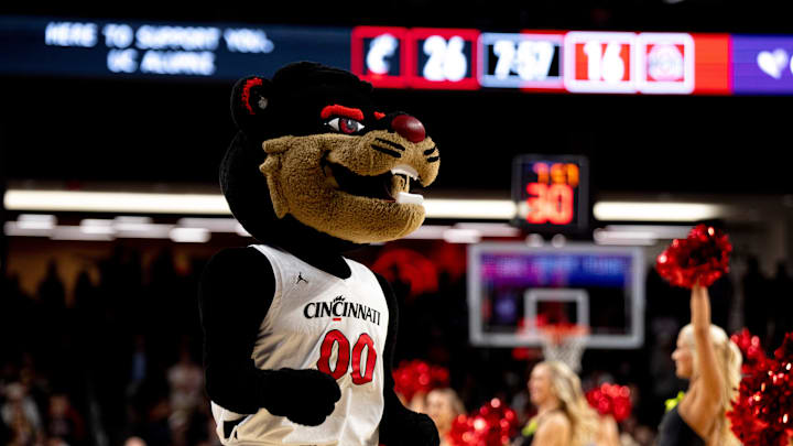 Cincinnati Bearcats mascot walks on the court during a timeout in the first half of a basketball scrimmage between Cincinnati Bearcats and Ohio State Buckeyes at Fifth Third Arena in Cincinnati on Friday, Oct. 18, 2024. Cincinnati Bearcats mascot walks on the court during a timeout in the first half of a basketball scrimmage between Cincinnati Bearcats and Ohio State Buckeyes at Fifth Third Arena in Cincinnati on Friday, Oct. 18, 2024.