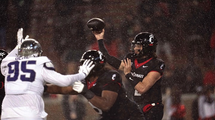 Nov 30, 2024; Cincinnati, Ohio, USA; Cincinnati Bearcats quarterback Brendan Sorsby (2) throws a pass against the TCU Horned Frogs in the fourth quarter at Nippert Stadium. Mandatory Credit: Albert Cesare/USA TODAY Network via Imagn Images