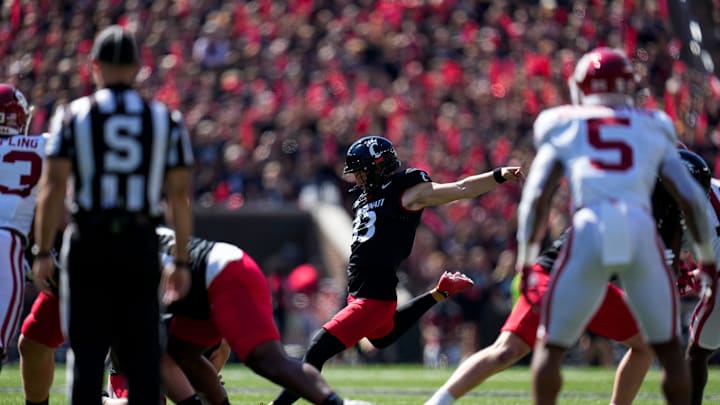 Cincinnati Bearcats place kicker Carter Brown (33) kicks a field goal in the first quarter of the NCAA Big 12 football game between the Cincinnati Bearcats and the Oklahoma Sooners at Nippert Stadium in Cincinnati on Saturday, Sept. 23, 2023. Cincinnati Bearcats place kicker Carter Brown (33) kicks a field goal in the first quarter of the NCAA Big 12 football game between the Cincinnati Bearcats and the Oklahoma Sooners at Nippert Stadium in Cincinnati on Saturday, Sept. 23, 2023.