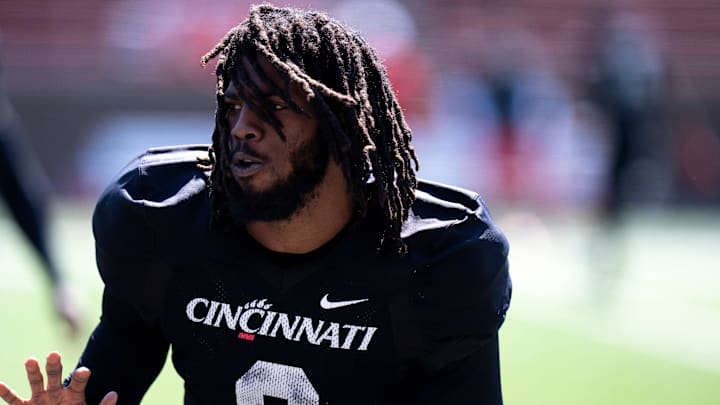 Cincinnati Bearcats defensive back Matthew McDoom (0) runs a drill during the Cincinnati Bearcats football spring practice at Nippert Stadium on Saturday, April 12, 2025.