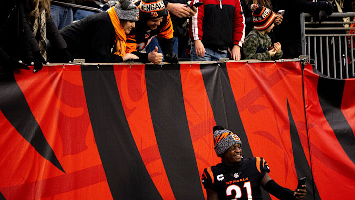 Cincinnati Bengals corner back Mike Hilton (21) takes a picture with fans in the fourth quarter of the NFL game between Cincinnati Bengals and Cleveland Browns at Paycor Stadium in Cincinnati on Sunday, Jan. 7, 2024.