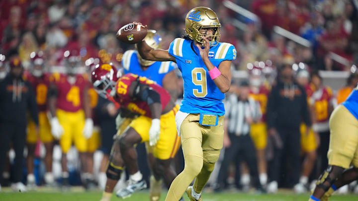 Nov 29, 2025; Los Angeles, California, USA; UCLA Bruins quarterback Nico Iamaleava (9) throws the ball against the Southern California Trojans in the first half at United Airlines Field at Los Angeles Memorial Coliseum. Mandatory Credit: Kirby Lee-Imagn Images Nov 29, 2025; Los Angeles, California, USA; UCLA Bruins quarterback Nico Iamaleava (9) throws the ball against the Southern California Trojans in the first half at United Airlines Field at Los Angeles Memorial Coliseum. Mandatory Credit: Kirby Lee-Imagn Images