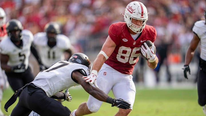 Oct 26, 2024; Stanford, California, USA; Stanford Cardinal tight end Sam Roush (86) breaks a tackle by Wake Forest Demon Deacons defensive back Zamari Stevenson (17) during the fourth quarter at Stanford Stadium. Mandatory Credit: Neville E. Guard-Imagn Images Oct 26, 2024; Stanford, California, USA; Stanford Cardinal tight end Sam Roush (86) breaks a tackle by Wake Forest Demon Deacons defensive back Zamari Stevenson (17) during the fourth quarter at Stanford Stadium. Mandatory Credit: Neville E. Guard-Imagn Images
