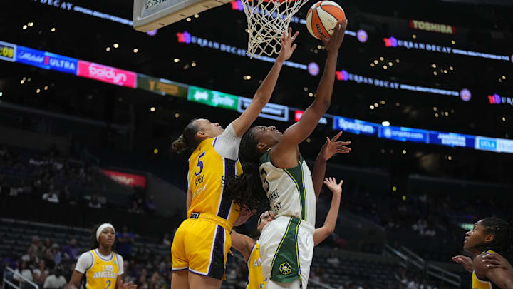 Sep 11, 2024; Los Angeles, California, USA; Seattle Storm forward Nneka Ogwumike (3) shoots the ball against LA Sparks forward Dearica Hamby (5) in the second half at Crypto.com Arena. Mandatory Credit: Kirby Lee-Imagn Images Sep 11, 2024; Los Angeles, California, USA; Seattle Storm forward Nneka Ogwumike (3) shoots the ball against LA Sparks forward Dearica Hamby (5) in the second half at Crypto.com Arena. Mandatory Credit: Kirby Lee-Imagn Images