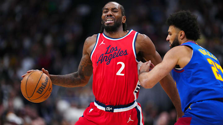 LA Clippers forward Kawhi Leonard (2) and Denver Nuggets guard Jamal Murray (27) in the first quarter during game seven of first round for the 2025 NBA Playoffs at Ball Arena. 