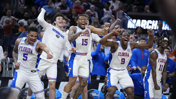 Mar 27, 2025; San Francisco, CA, USA; Florida Gators guard Alijah Martin (15), guard Will Richard (5) and center Rueben Chinyelu (9) celebrate on the Florida Gators bench during the second half against the Maryland Terrapins during a West Regional semifinal of the 2025 NCAA tournament at Chase Center. Mandatory Credit: Kyle Terada-Imagn Images