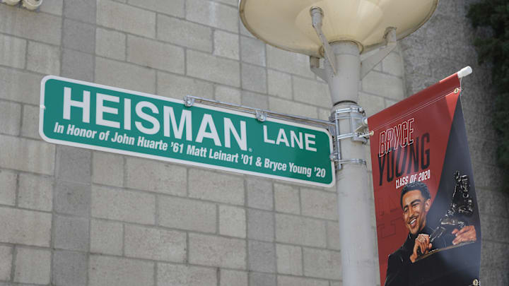 May 24, 2022; Santa Ana, California USA; A Heisman Lane street sign in honor of John Huarte (1961), Matt Leinart (2001) and Bryce Young (2020) during the Mater Dei High Heisman Homecoming ceremony at the Meruelo Athletic Center. Mandatory Credit: Kirby Lee-Imagn Images
