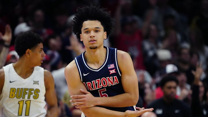 Mar 7, 2026; Boulder, Colorado, USA; Arizona Wildcats guard Brayden Burries (5) reacts to his three point score in the second half against the Colorado Buffaloes at the CU Events Center. Mandatory Credit: Ron Chenoy-Imagn Images