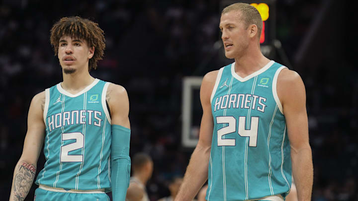 Mar 5, 2022; Charlotte, North Carolina, USA; Charlotte Hornets guard LaMelo Ball (2) and center Mason Plumlee (24) talk during a break in the first quarter against the San Antonio Spurs at the Spectrum Center. Mandatory Credit: Jim Dedmon-Imagn Images Mar 5, 2022; Charlotte, North Carolina, USA; Charlotte Hornets guard LaMelo Ball (2) and center Mason Plumlee (24) talk during a break in the first quarter against the San Antonio Spurs at the Spectrum Center. Mandatory Credit: Jim Dedmon-Imagn Images