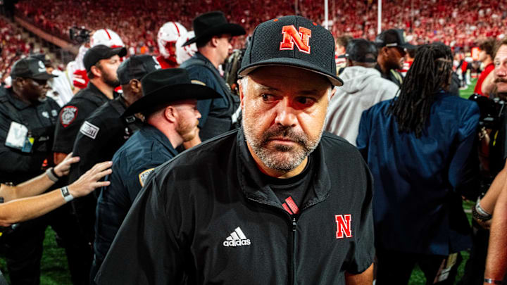 Sep 7, 2024; Lincoln, Nebraska, USA; Nebraska Cornhuskers head coach Matt Rhule walks off the field after defeating the Colorado Buffaloes at Memorial Stadium. Mandatory Credit: Dylan Widger-Imagn Images