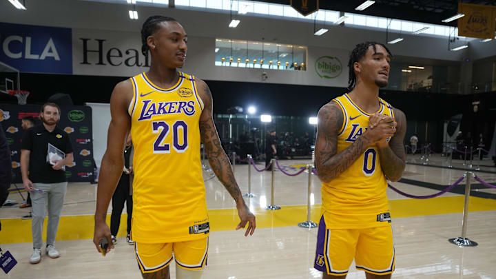 Sep 30, 2024; El Segundo, CA, USA; Los Angeles Lakers forward Maxwell Lewis (20) and guard Jalen Hood-Schifino (0) during media day at the UCLA Health Training Center. Mandatory Credit: Kirby Lee-Imagn Images Sep 30, 2024; El Segundo, CA, USA; Los Angeles Lakers forward Maxwell Lewis (20) and guard Jalen Hood-Schifino (0) during media day at the UCLA Health Training Center. Mandatory Credit: Kirby Lee-Imagn Images