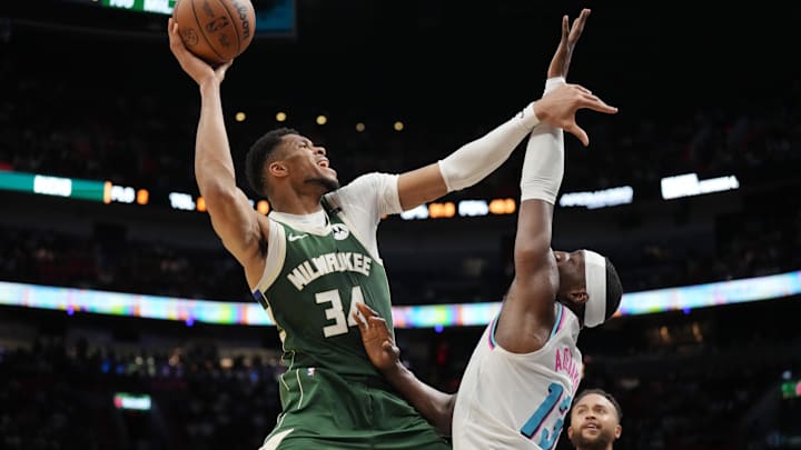 Apr 5, 2025; Miami, Florida, USA; Milwaukee Bucks forward Giannis Antetokounmpo (34) goes up for a shot as Miami Heat center Bam Adebayo (13) defends during the second half at Kaseya Center. Mandatory Credit: Jim Rassol-Imagn Images Apr 5, 2025; Miami, Florida, USA; Milwaukee Bucks forward Giannis Antetokounmpo (34) goes up for a shot as Miami Heat center Bam Adebayo (13) defends during the second half at Kaseya Center. Mandatory Credit: Jim Rassol-Imagn Images