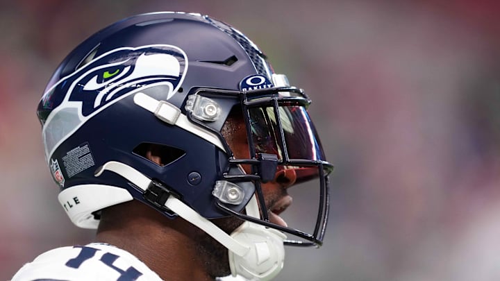 Jan 7, 2024; Glendale, Arizona, USA; Seattle Seahawks wide receiver DK Metcalf (14) warms up prior to facing the Arizona Cardinals at State Farm Stadium. Mandatory Credit: Joe Camporeale-Imagn Images