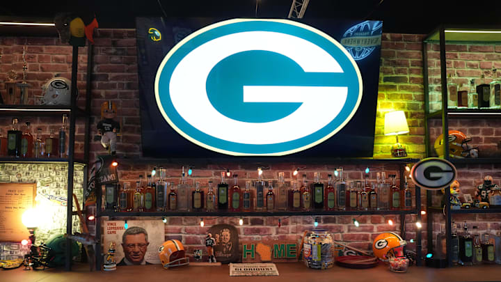 Apr 23, 2025; Green Bay, WI, USA; A Green Bay Packers logo at the Packer Everywhere Draft Haus at the NFL Draft Experience at Lambeau Field. Mandatory Credit: Kirby Lee-Imagn Images Apr 23, 2025; Green Bay, WI, USA; A Green Bay Packers logo at the Packer Everywhere Draft Haus at the NFL Draft Experience at Lambeau Field. Mandatory Credit: Kirby Lee-Imagn Images