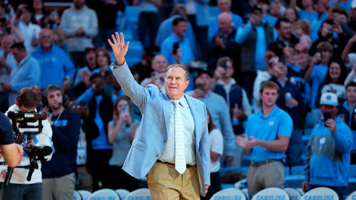 Dec 14, 2024; Chapel Hill, North Carolina, USA; North Carolina Tar Heels head football coach Bill Belichick is introduced during half time at Dean E. Smith Center. Dec 14, 2024; Chapel Hill, North Carolina, USA; North Carolina Tar Heels head football coach Bill Belichick is introduced during half time at Dean E. Smith Center.