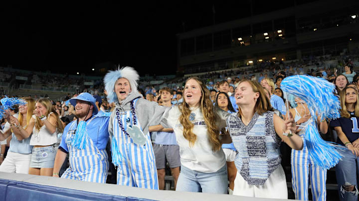 Nov 8, 2025; Chapel Hill, North Carolina, USA;  North Carolina Tar Heels fans cheer in the third quarter at Kenan Stadium. Mandatory Credit: Bob Donnan-Imagn Images