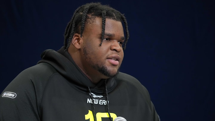 Feb 26, 2025; Indianapolis, IN, USA; Michigan defensive lineman Kenneth Grant (DL12) during the 2025 NFL Scouting Combine at the Indiana Convention Center. Feb 26, 2025; Indianapolis, IN, USA; Michigan defensive lineman Kenneth Grant (DL12) during the 2025 NFL Scouting Combine at the Indiana Convention Center.
