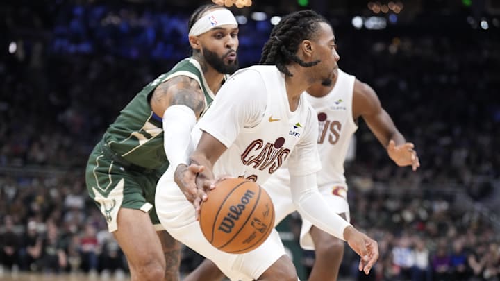 Nov 2, 2024; Milwaukee, Wisconsin, USA; Cleveland Cavaliers guard Darius Garland (10) drives to the basket against Milwaukee Bucks guard Gary Trent Jr. (5) in the first half at Fiserv Forum. Mandatory Credit: Michael McLoone-Imagn Images