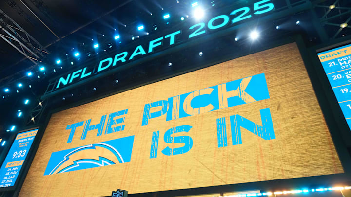 The Los Angeles Chargers logo is projected on the video board during the NFL Draft at Lambeau Field. The Los Angeles Chargers logo is projected on the video board during the NFL Draft at Lambeau Field.