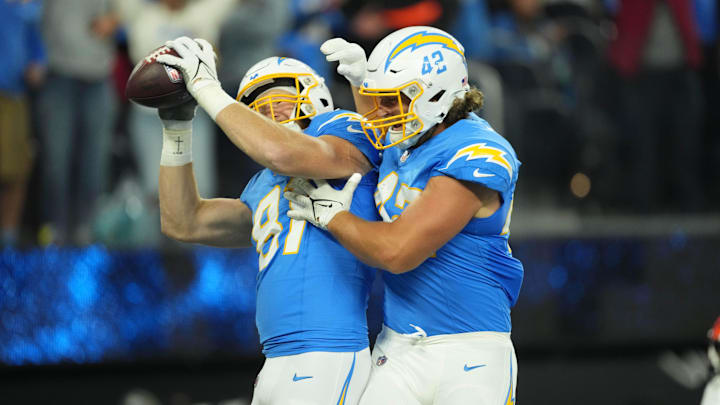 Los Angeles Chargers TE Will Dissly celebrates with Tucker Fisk after scoring on a 29-yard touchdown reception