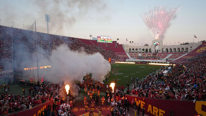 Los Angeles, California, USA; A general overall view as Southern California Trojans players enter the field against the UCLA Bruins at United Airlines Field at Los Angeles Memorial Coliseum. Los Angeles, California, USA; A general overall view as Southern California Trojans players enter the field against the UCLA Bruins at United Airlines Field at Los Angeles Memorial Coliseum.