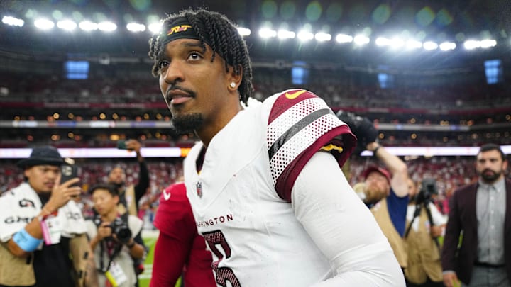 Washington quarterback Jayden Daniels leaves the field after defeating the Cardinals during a game at State Farm Stadium in Glendale on Sept. 29, 2024.