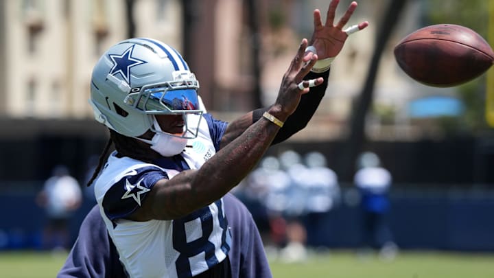 Dallas Cowboys receiver CeeDee Lamb catches the ball at training camp at the River Ridge Fields. Dallas Cowboys receiver CeeDee Lamb catches the ball at training camp at the River Ridge Fields.