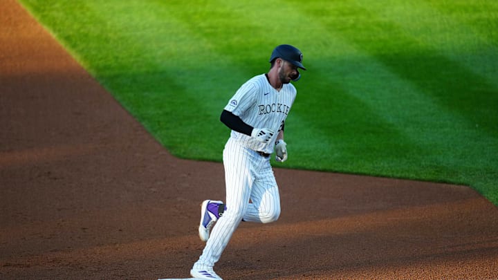 Colorado Rockies first base Kris Bryant (23) heads home to score after his two run home run in the third inning against the Cleveland Guardians at Coors Field on May 28.