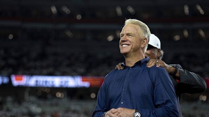 Boomer Esiason smiles while being announced at halftime as a Bengals Ring of Champions inductee at halftime of the NFL game between the Cincinnati Bengals and Los Angeles Rams at Paycor Stadium in 2023.