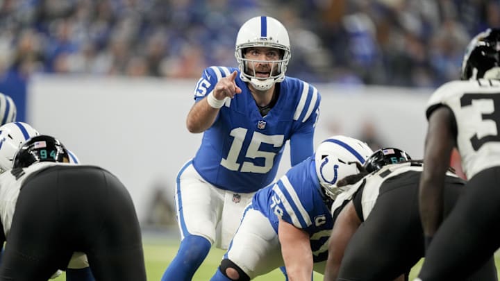 Jan 5, 2025; Indianapolis, Indiana, USA; Indianapolis Colts quarterback Joe Flacco (15) yells from the line of scrimmage during a game against the Jacksonville Jaguars at Lucas Oil Stadium.  